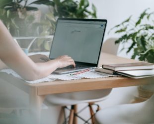 woman working on laptop at home