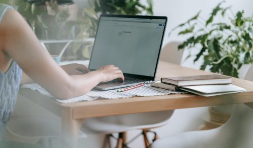 woman working on laptop at home